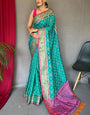 Classic Turquoise Patola Silk Saree with Winsome Blouse Piece