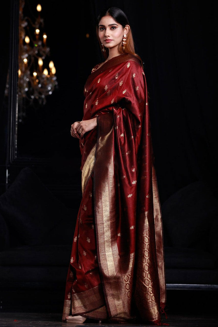 Intricate Maroon Banarasi Silk Saree With Smashing Blouse Piece