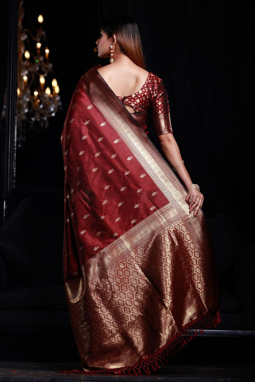 Intricate Maroon Banarasi Silk Saree With Smashing Blouse Piece