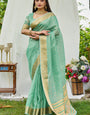 Embrocation Turquoise Cotton Silk Saree With Scrumptious Blouse Piece