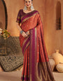 Cynosure Orange Pure Zari Weaving Banarasi Silk Saree With Serendipity Blouse Piece