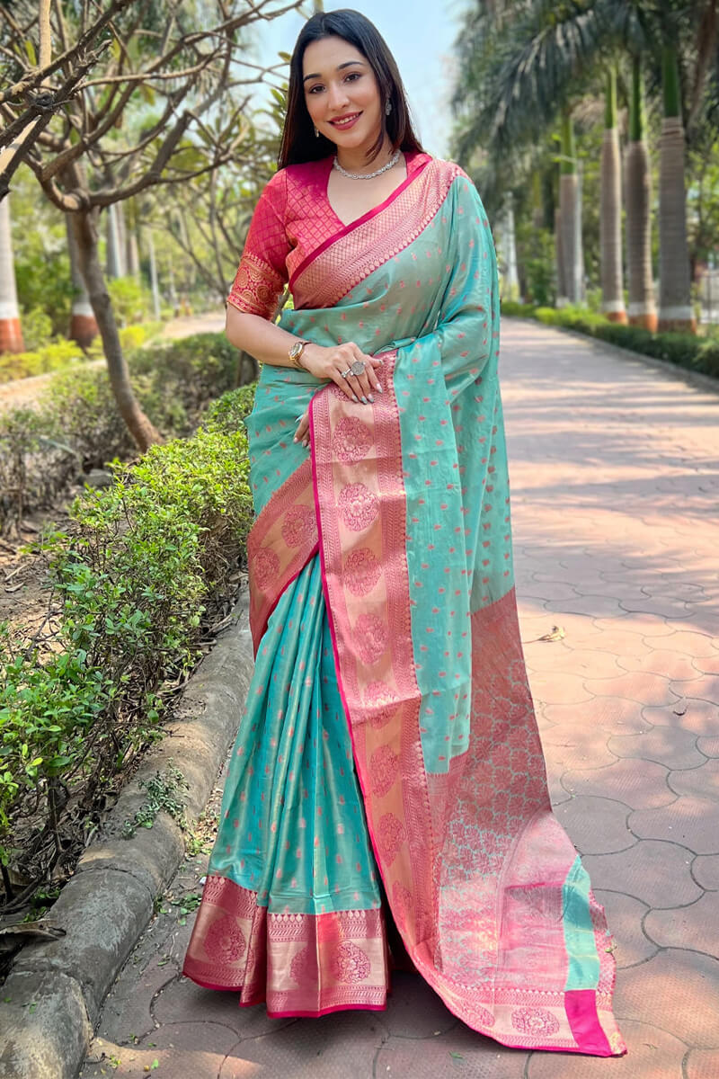 Allure Firozi Soft Banarasi Tissue Silk Saree With Piquant Blouse Piece