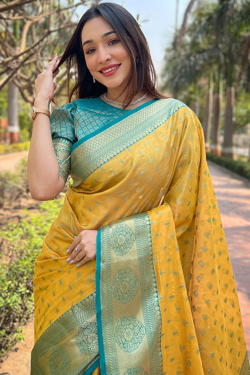 Petrichor Yellow Soft Banarasi Tissue Silk Saree With Redolent Blouse Piece