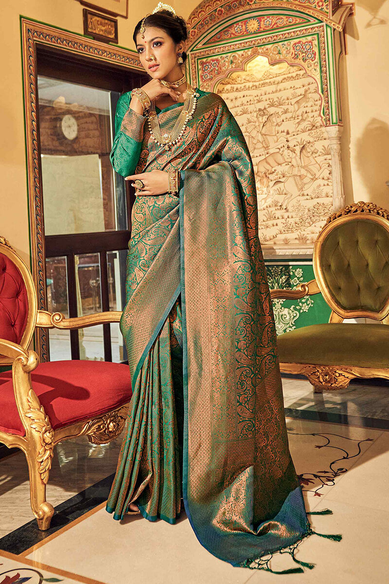 Staring Dark Green Kanjivaram Silk Saree With Admirable Blouse Piece