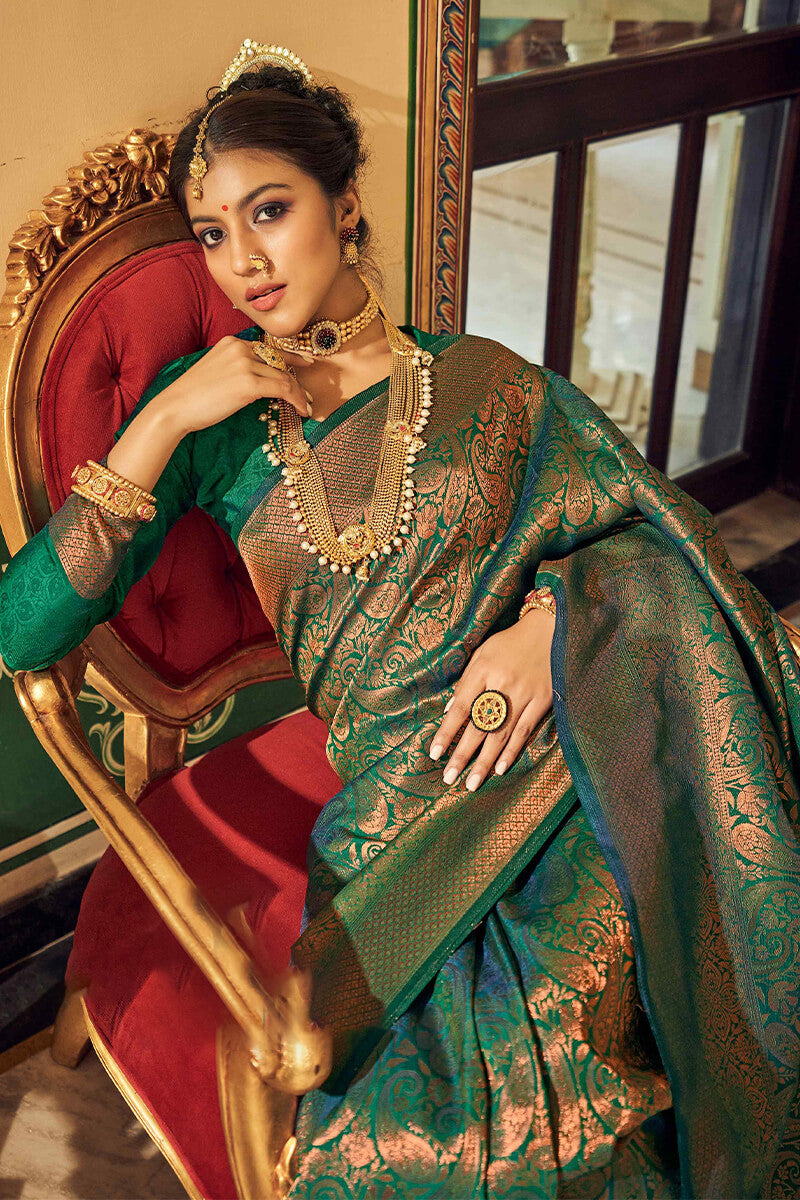 Staring Dark Green Kanjivaram Silk Saree With Admirable Blouse Piece