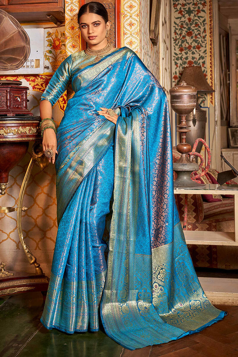 Blooming Firozi Kanjivaram Silk Saree With Engrossing Blouse Piece