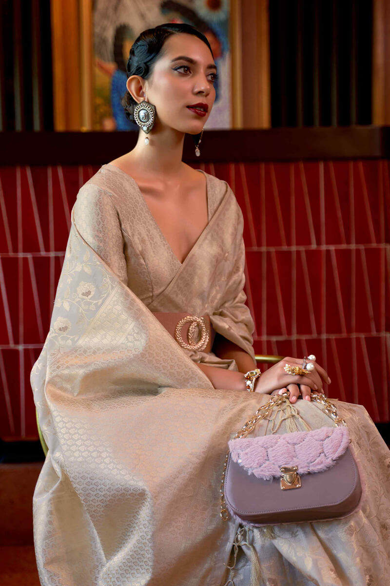 Groovy Beige Soft Banarasi Silk Saree With Flaunt Blouse Piece