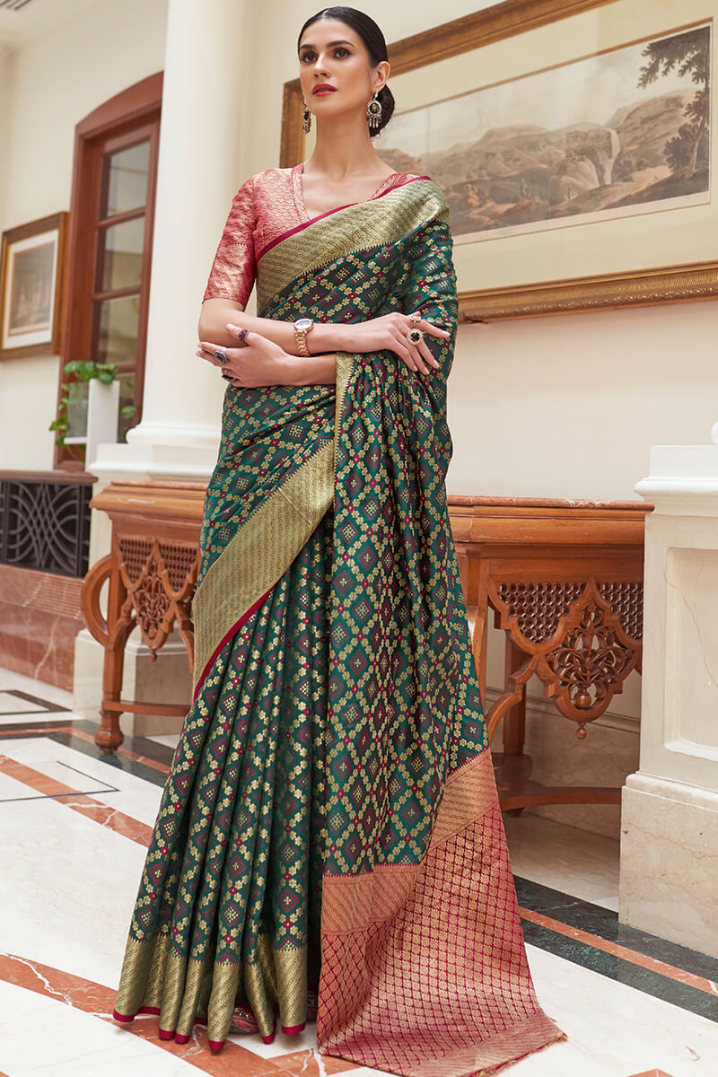 Demure Dark Green Soft Patola Silk Saree with Ethereal Blouse Piece