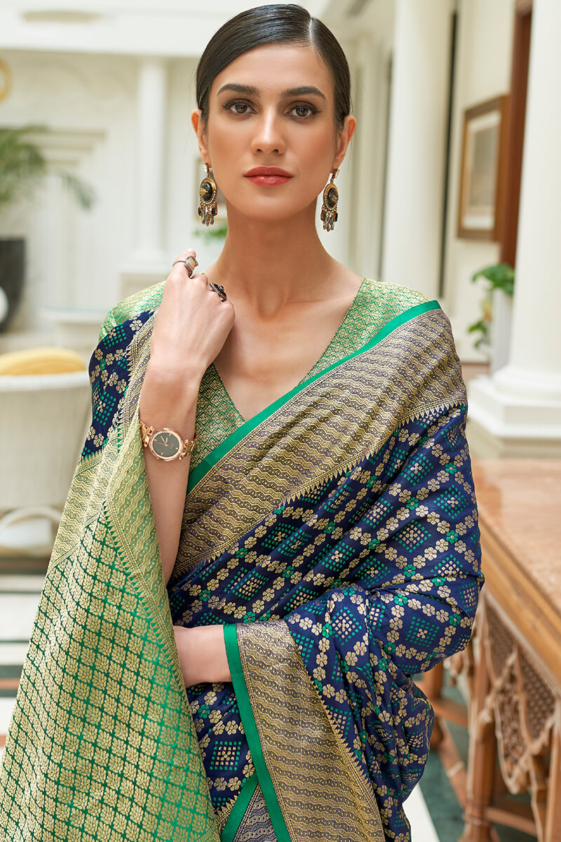 Dissemble Navy Blue Soft Patola Silk Saree with Scrupulous Blouse Piece