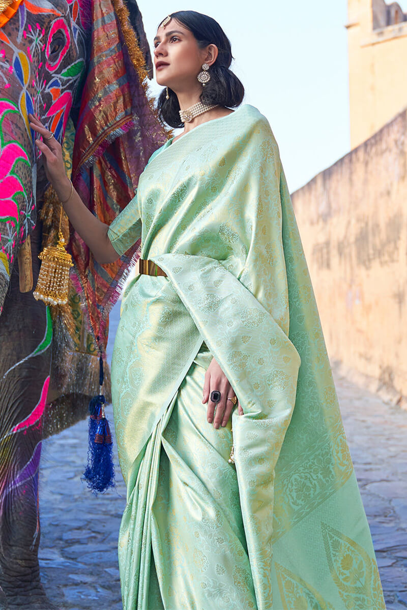 Conflate Pista Kanjivaram Silk Saree with Ravishing Blouse Piece