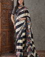Evocative Black Ajrakh Printed Semi Modal Silk Saree With Staggering Blouse Piece