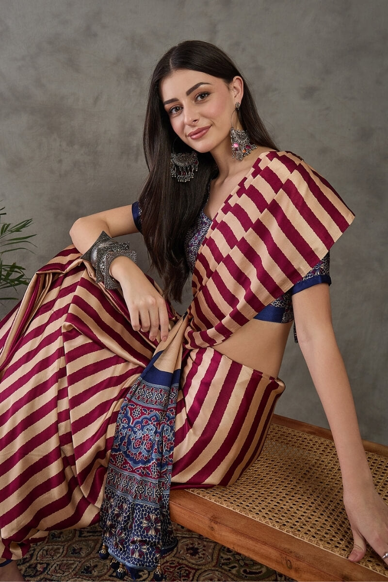 Impressive Maroon Ajrakh Printed Semi Modal Silk Saree With Enticing Blouse Piece