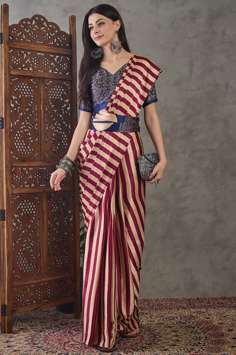 Impressive Maroon Ajrakh Printed Semi Modal Silk Saree With Enticing Blouse Piece