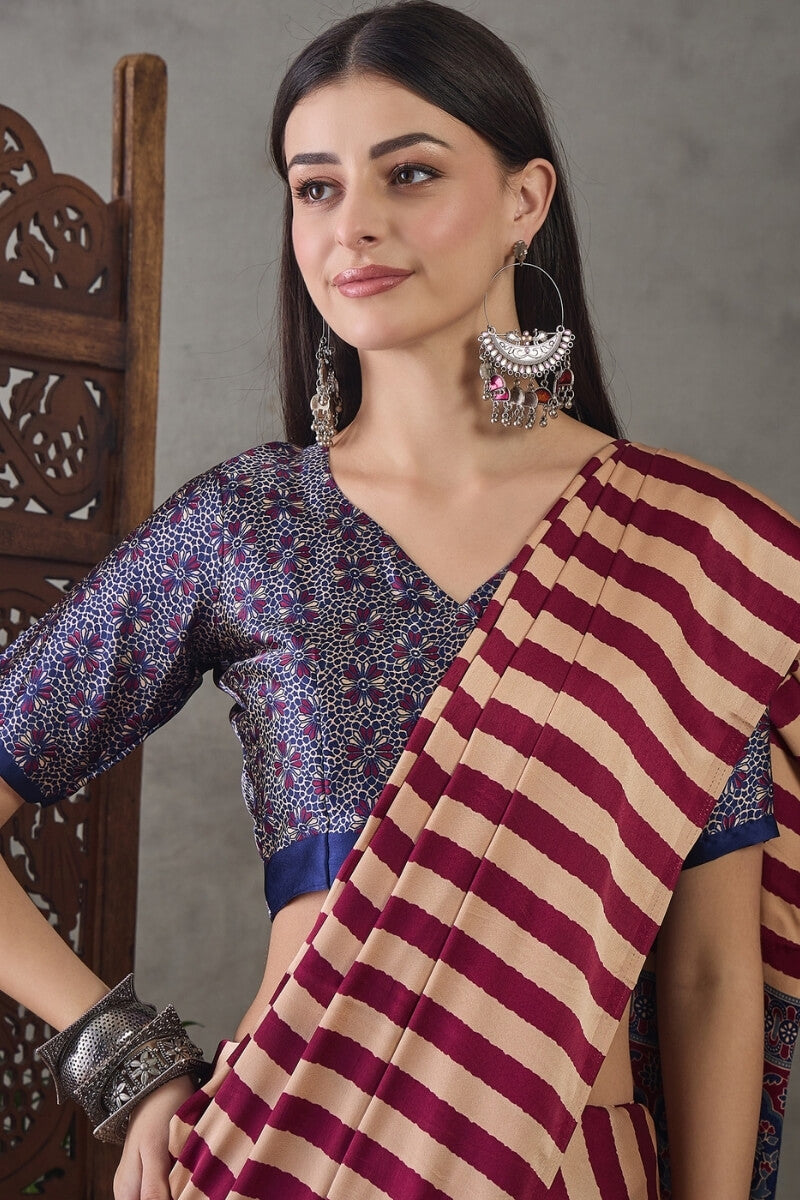 Impressive Maroon Ajrakh Printed Semi Modal Silk Saree With Enticing Blouse Piece