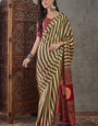 Mesmerising Green Ajrakh Printed Semi Modal Silk Saree With Elaborate Blouse Piece