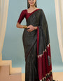Ravishing Black Ajrakh Printed Semi Modal Silk Saree With Transcendent Blouse Piece