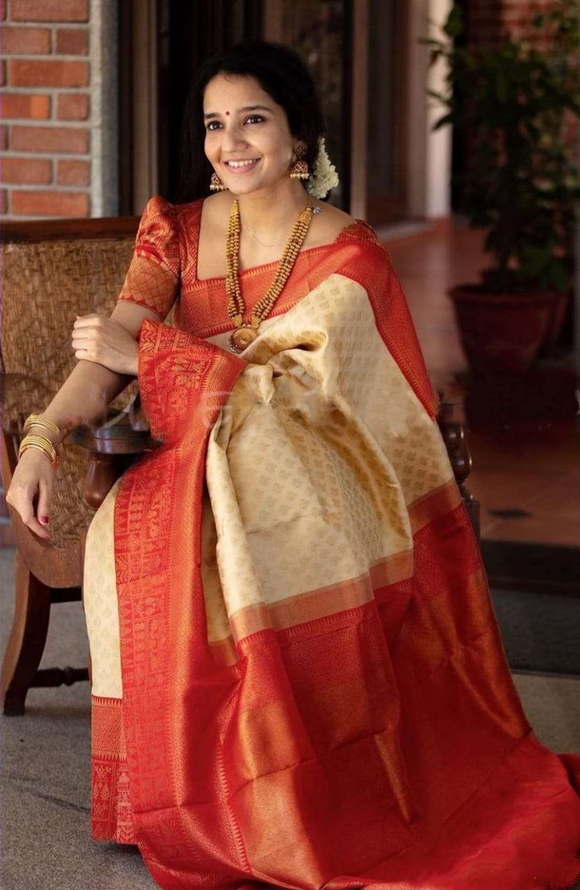 Ephemeral  Beige Soft Banarasi Silk Saree With Glowing Blouse Piece