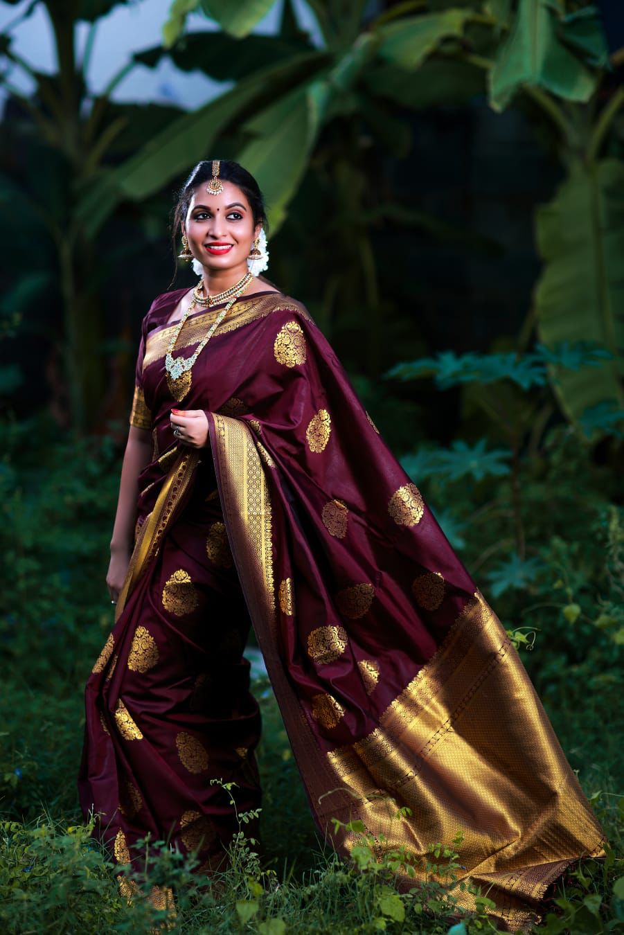 Unique Wine Soft Banarasi Silk Saree With Gratifying Blouse Piece