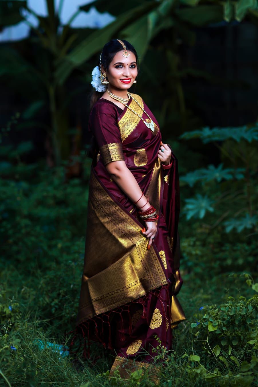 Unique Wine Soft Banarasi Silk Saree With Gratifying Blouse Piece