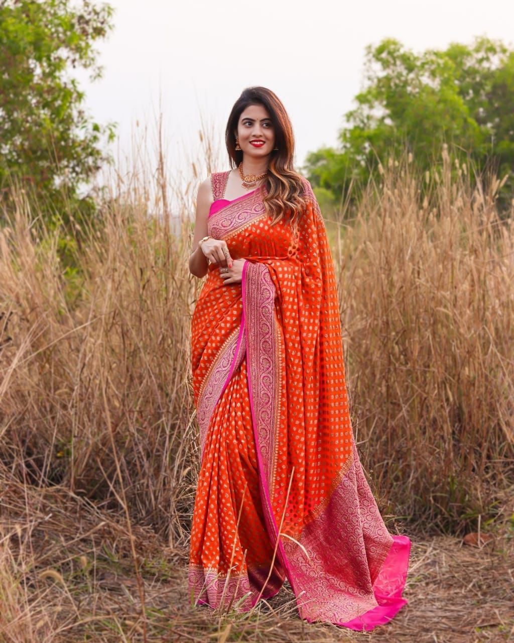 Appealing Orange Soft Banarasi Silk Saree With Twirling Blouse Piece