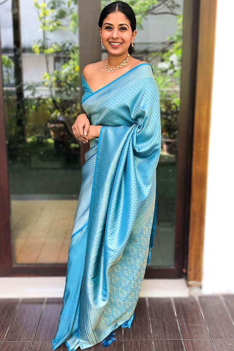 Enamoring Firozi Soft Silk Saree With Excellent Blouse Piece