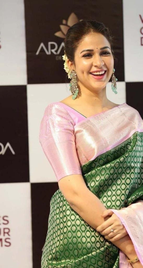 Bucolic Dark Green Soft Silk Saree With Redolent Blouse Piece