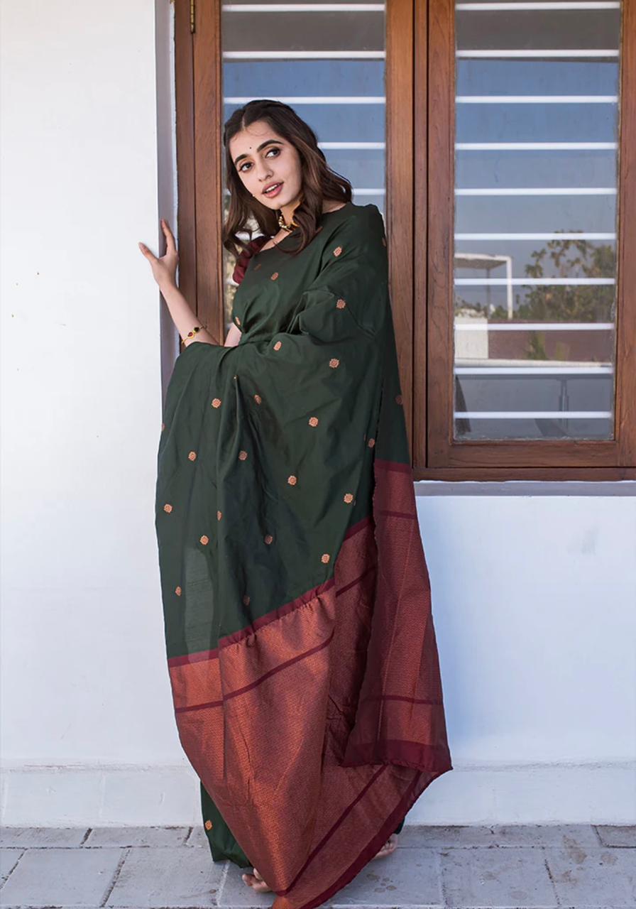 Beleaguer Dark Green Soft Silk Saree With Staggering Blouse Piece