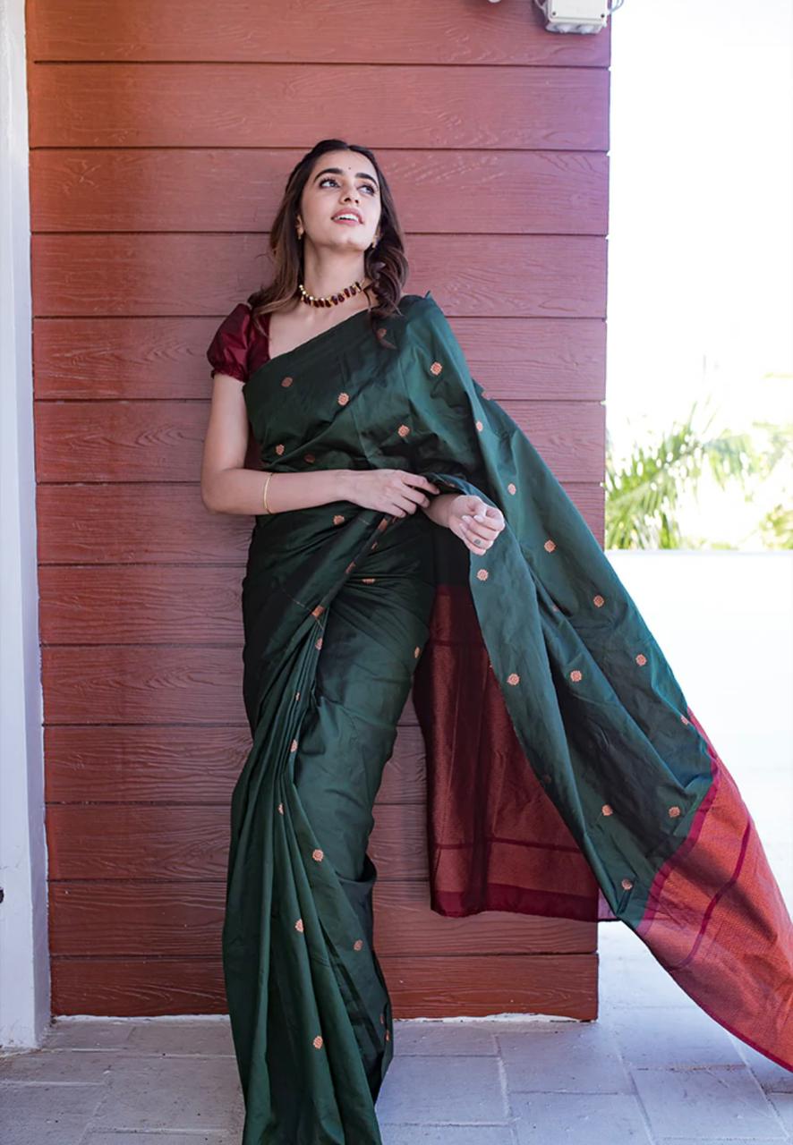 Beleaguer Dark Green Soft Silk Saree With Staggering Blouse Piece