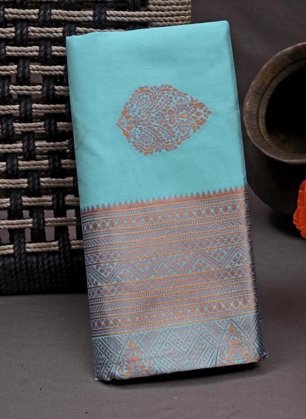 Glamorous Firozi Soft Silk Saree With Unequalled Blouse Piece