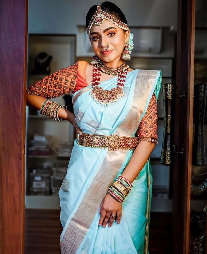 Glamorous Firozi Soft Silk Saree With Unequalled Blouse Piece