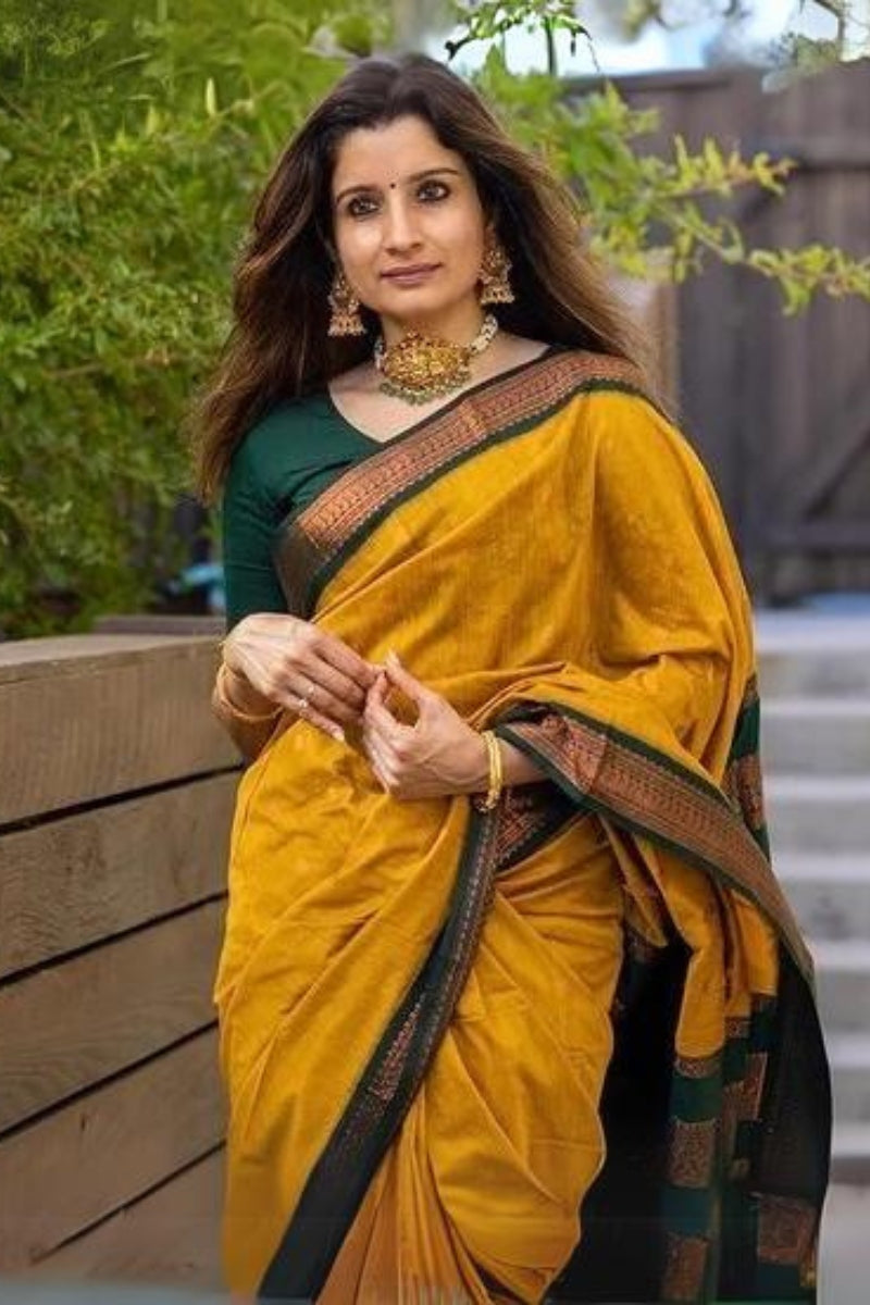 Delectable Mustard Soft Silk Saree With Embellished Blouse Piece