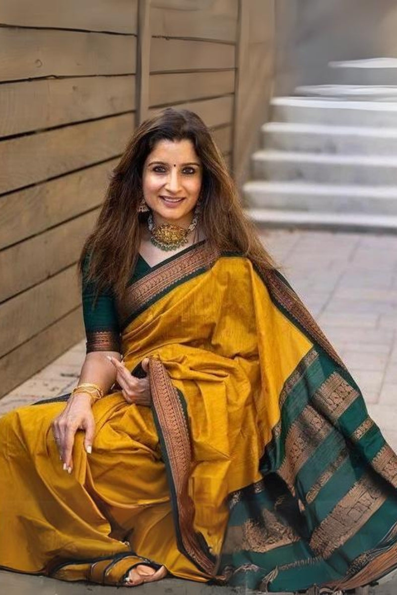 Delectable Mustard Soft Silk Saree With Embellished Blouse Piece
