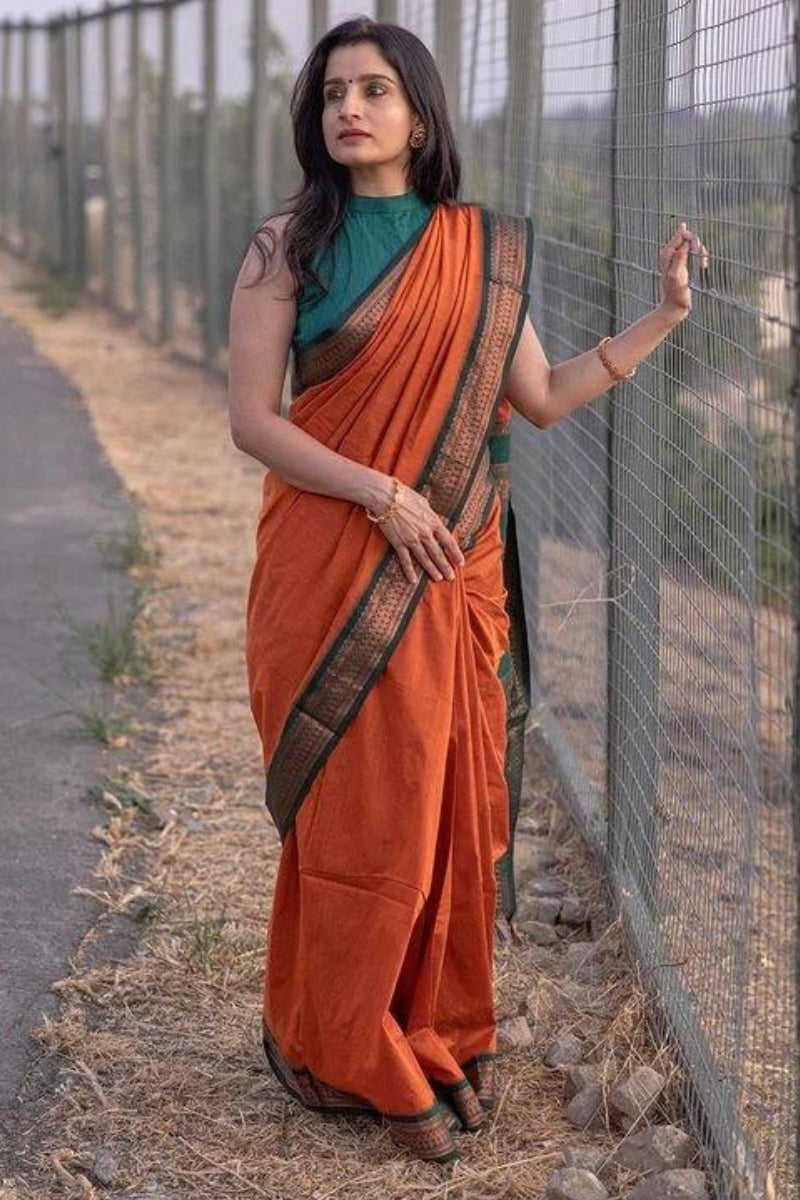Woebegone Orange Soft Silk Saree With Nectarous Blouse Piece