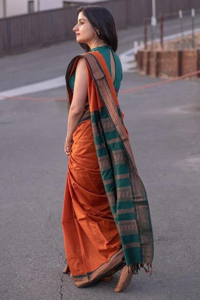 Woebegone Orange Soft Silk Saree With Nectarous Blouse Piece