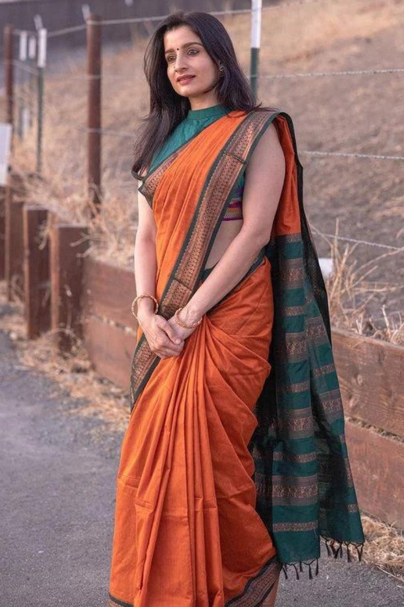 Woebegone Orange Soft Silk Saree With Nectarous Blouse Piece