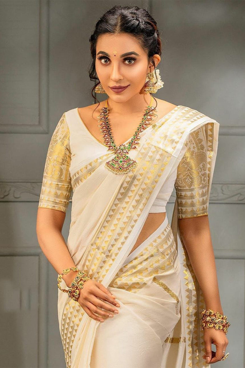 Quintessential Off White Soft Silk Saree With Scrumptious Blouse Piece
