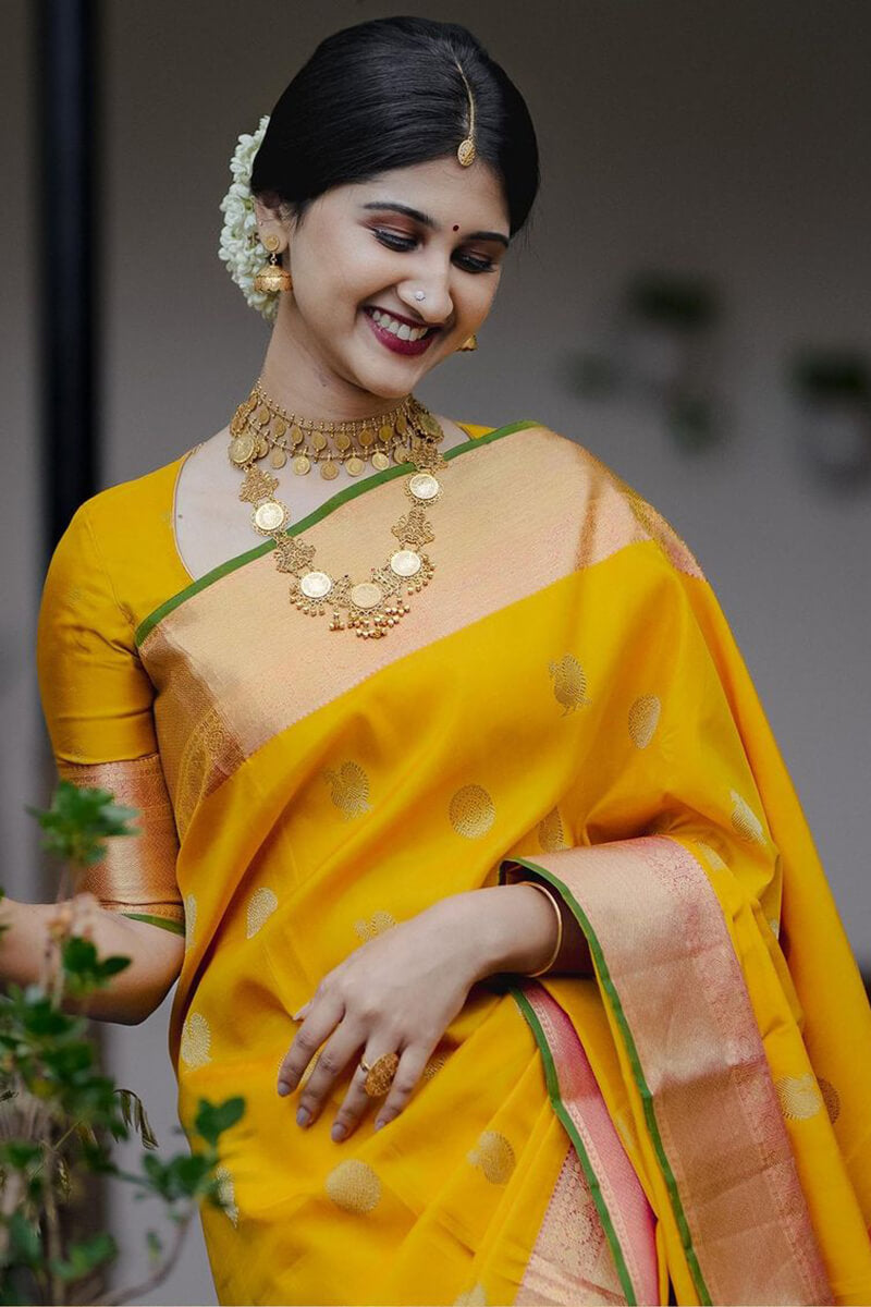 Devastating Yellow Soft Silk Saree With Mesmeric Blouse Piece