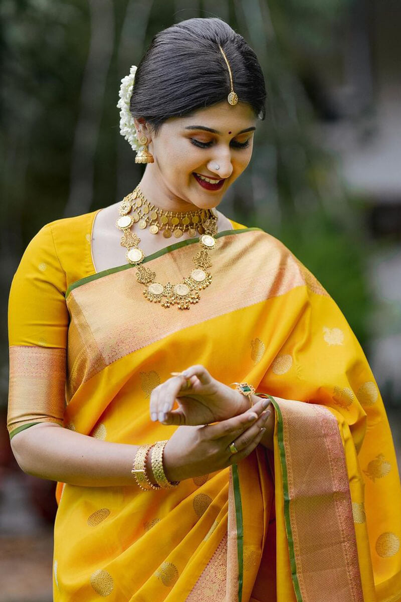 Devastating Yellow Soft Silk Saree With Mesmeric Blouse Piece