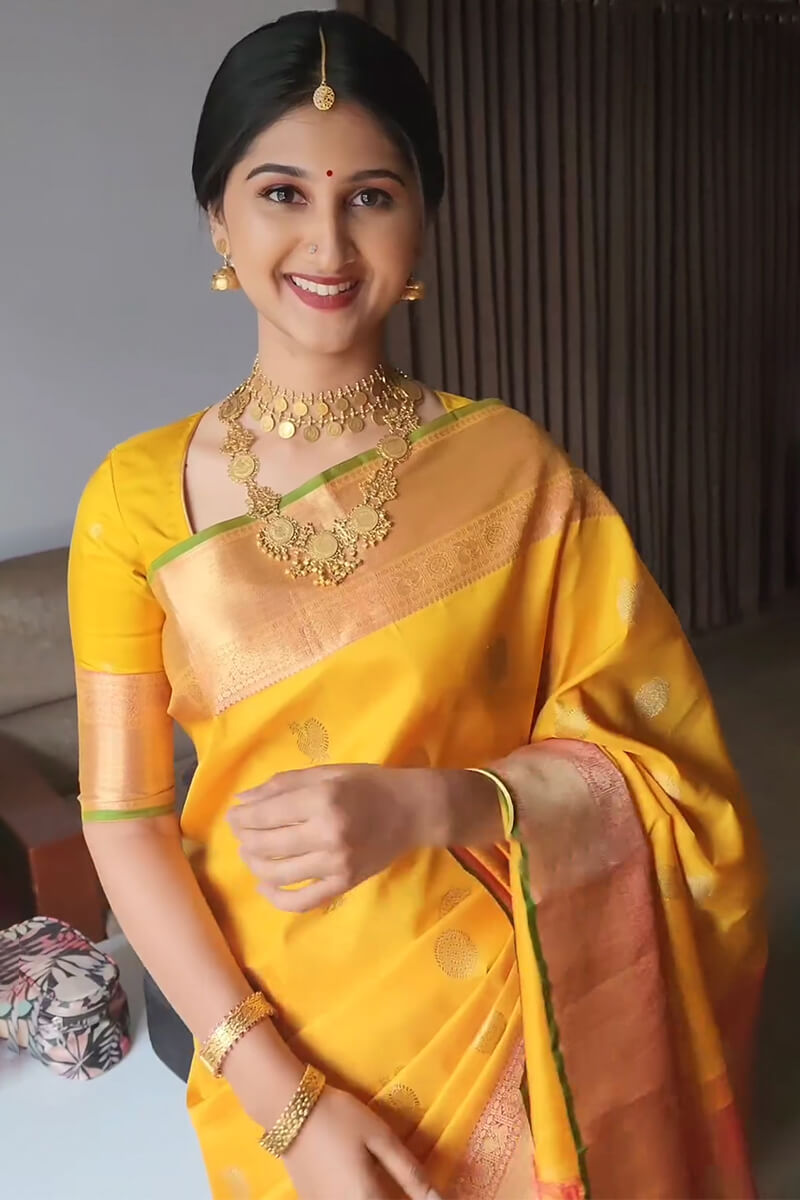Devastating Yellow Soft Silk Saree With Mesmeric Blouse Piece