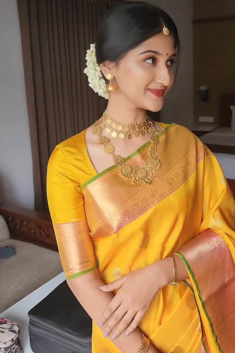 Devastating Yellow Soft Silk Saree With Mesmeric Blouse Piece