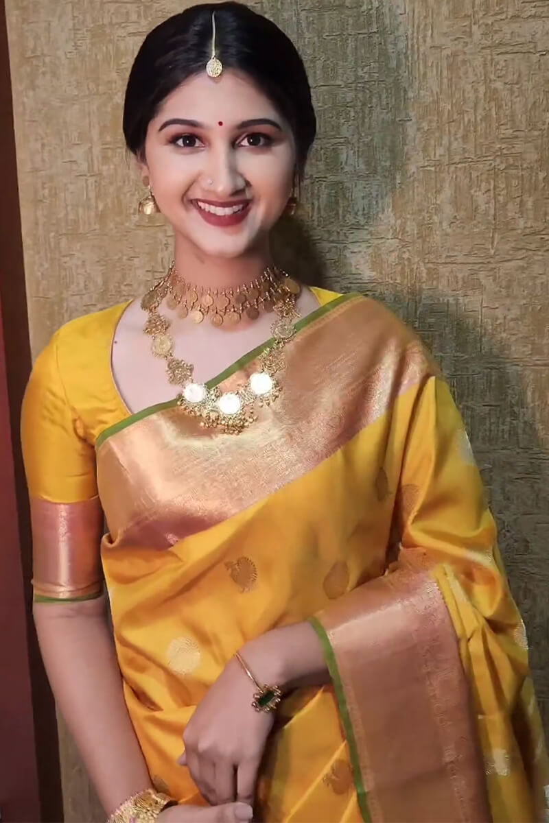 Devastating Yellow Soft Silk Saree With Mesmeric Blouse Piece