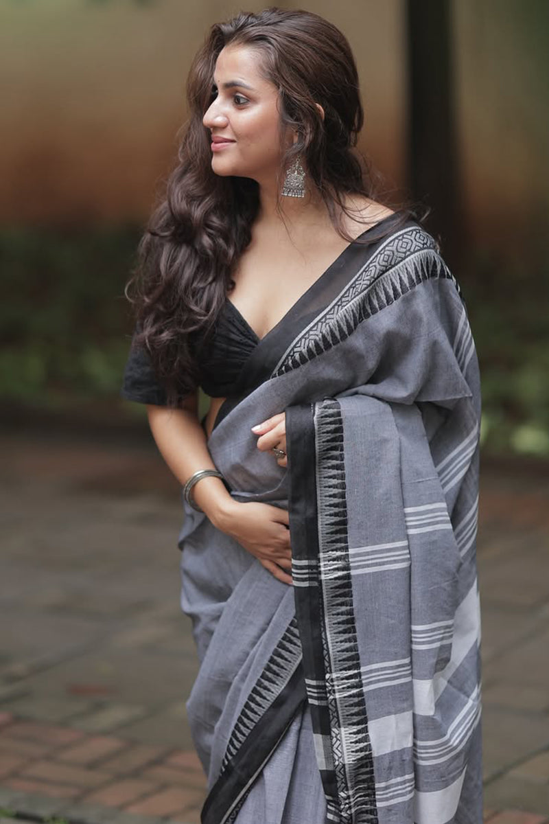 Alluring Grey Cotton Silk Saree With Dazzling Blouse Piece