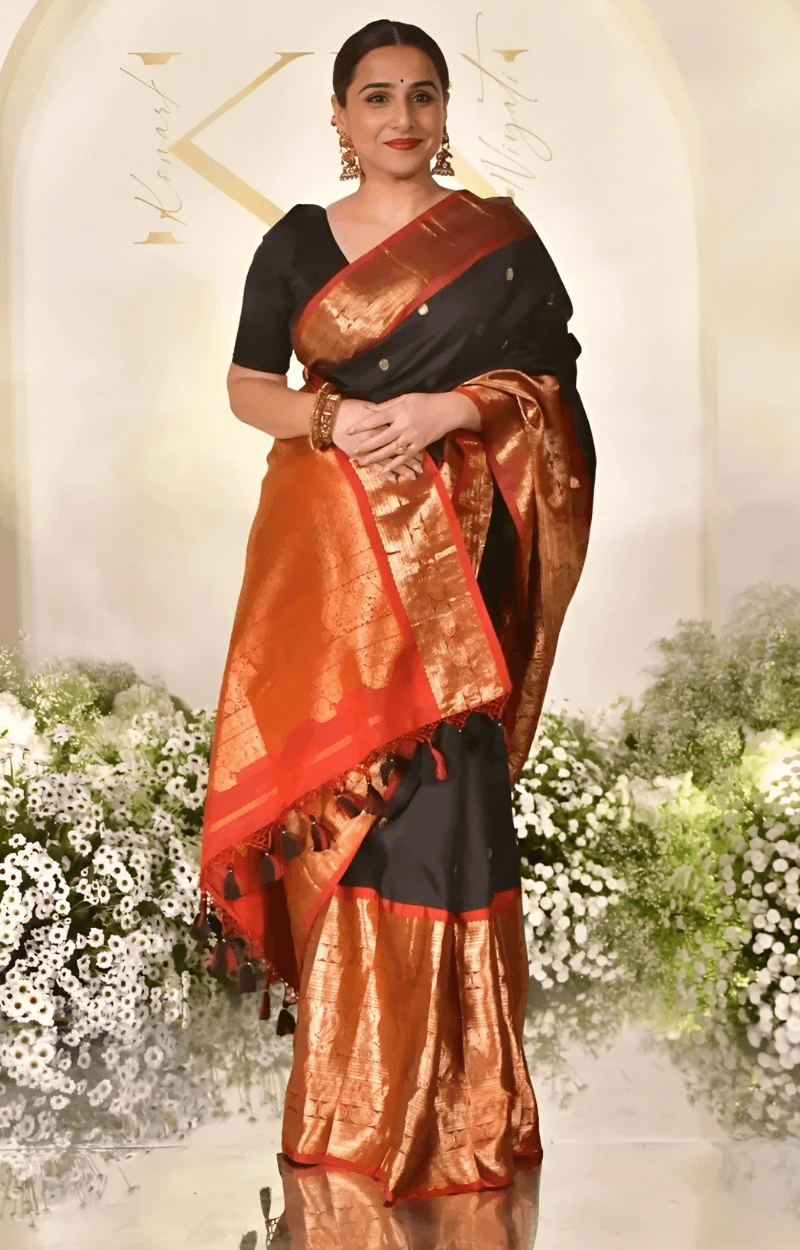 Snazzy Black Soft Banarasi Silk Saree With Rhapsody Blouse Piece