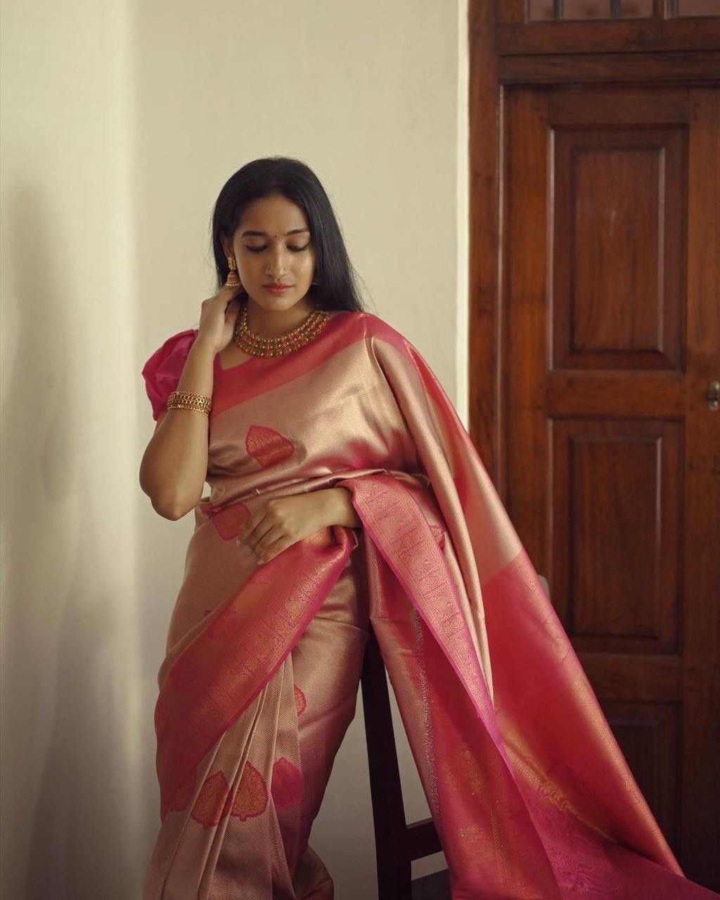 Murmurous Peach Soft Silk Saree With Unique Blouse Piece
