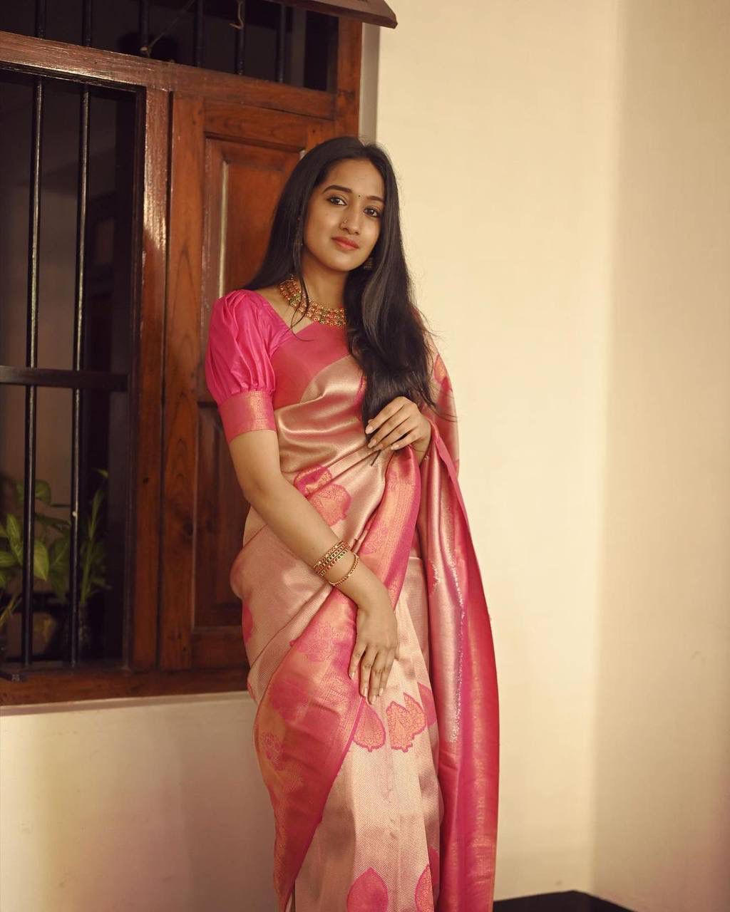 Murmurous Peach Soft Silk Saree With Unique Blouse Piece