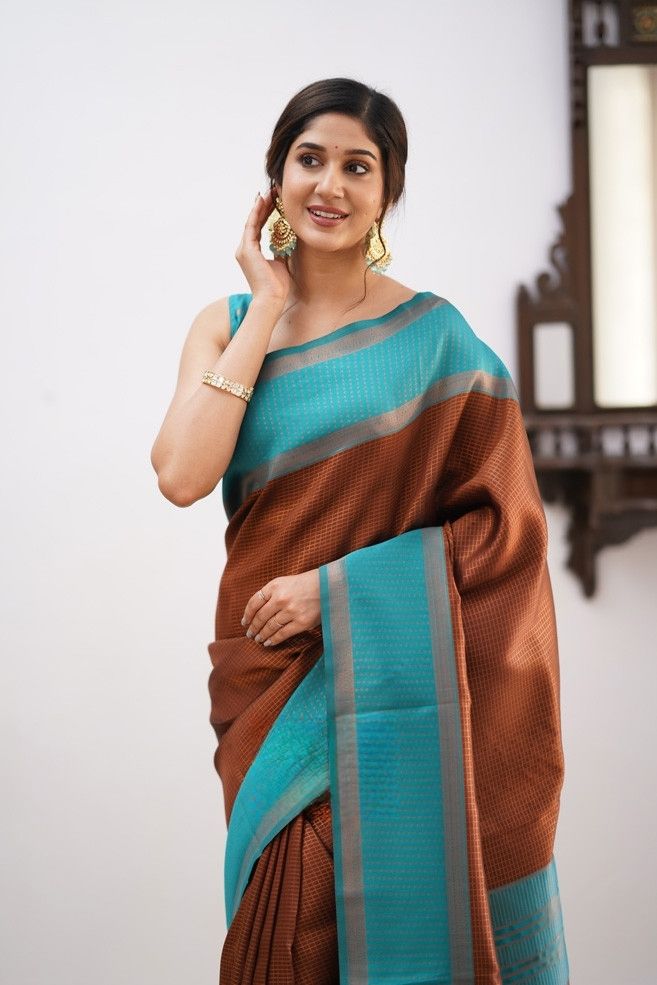 Jazzy Brown Soft Silk Saree With Opulent Blouse Piece