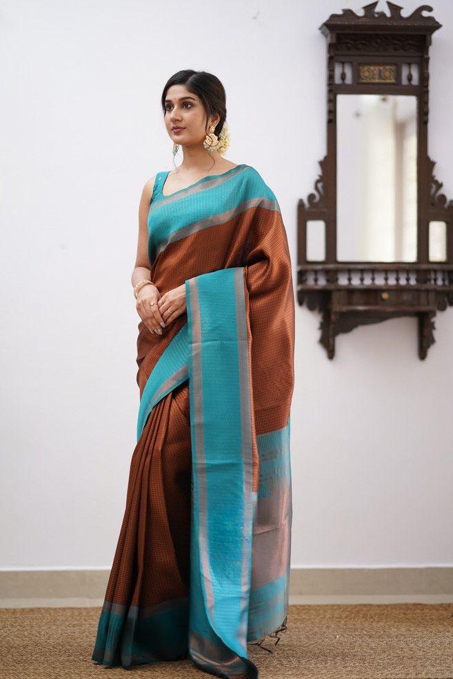 Jazzy Brown Soft Silk Saree With Opulent Blouse Piece