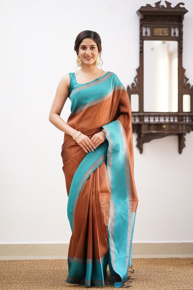 Jazzy Brown Soft Silk Saree With Opulent Blouse Piece