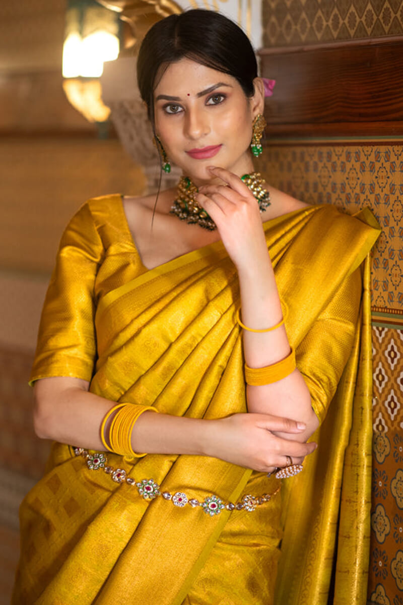 Supernal Yellow Soft Silk Saree With Energetic Blouse Piece