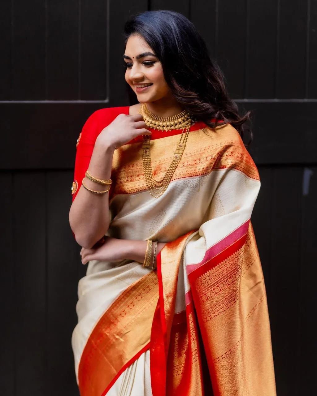 Entrancing Beige Soft Silk Saree With Aplomb Blouse Piece